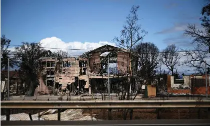  ?? ?? Destroyed homes and businesses in the aftermath of the Maui wildfires in Lahaina, Hawaii. Photograph: Patrick T Fallon/AFP/Getty Images