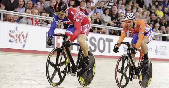  ??  ?? The cyclist to beat: Britain’s Chris Hoy (left) crossing the line ahead of Holland’s Teun Mulder to win the men’s keirin gold medal at the track cycling World Cup in London on Saturday.