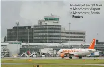  ?? — Reuters ?? An easyJet aircraft taxis at Manchester Airport in Manchester, Britain.