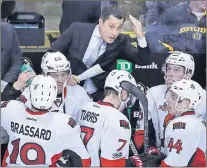  ?? Ap photo ?? Ottawa Senators head coach Guy Boucher talks to his players during a time out by the Boston Bruins in the third period of Game 4 of a first-round NHL hockey playoff series in Boston, Wednesday, April 19, 2017. The Senators defeated the Bruins 1-0.