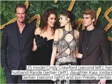  ??  ?? US model Cindy Crawford (second left), her husband Rande Gerber (left), daughter Kaia Jordan Gerber (second right) and son Presley Gerber.