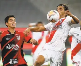  ?? Rodolfo Buhrer Associated Press ?? SANTIAGO SOSA of Argentina, right, is among the young South American players who have signed on with MLS teams. Atlanta added Sosa and Franco Ibarra.