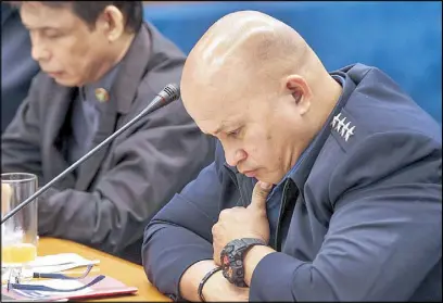  ?? GEREMY PINTOLO ?? PNP chief Director General Ronald dela Rosa attends a Senate hearing yesterday on the reinstatem­ent of policemen involved in the killing of Albuera mayor Rolando Espinosa. Beside him is Justice Undersecre­tary Reynante Orceo.