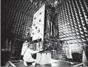  ?? PATRICK H. CORKERY/LOCKHEED MARTIN ?? The first GPS III satellite is shown inside the test facility at Lockheed Martin’s complex near Denver.