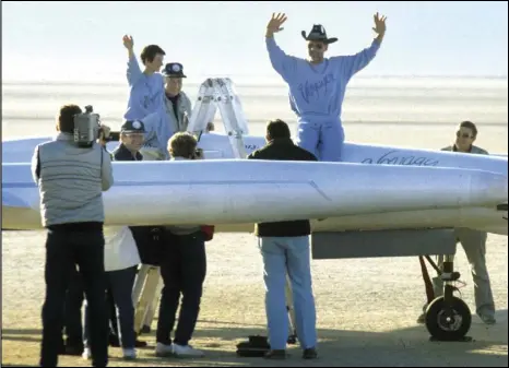  ?? VALLEY PRESS FILES ?? Pilot Dick Rutan raises his arms historic around-the-world flight after completing Voyager’s with co-pilot Jeana Yeager in 1986. Rutan has been honored with the Howard Hughes Award from the Aero Club of Southern California.
