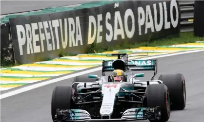  ??  ?? Lewis Hamilton powers his car at the Autódromo José Carlos Pace, a marvellous circuit which suffered five armed robberies on F1 staff during the Brazilian Grand Prix. Photograph: Evaristo Sa/AFP/Getty Images