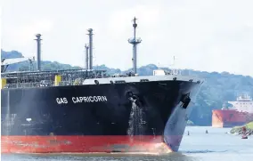  ?? AP ?? A cargo ship navigates through Panama Canal waters in Gamboa, Panama, on Wednesday, June 17.
