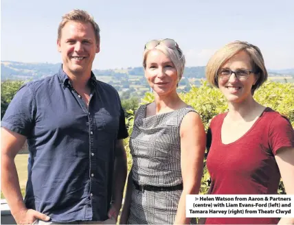  ??  ?? > Helen Watson from Aaron & Partners (centre) with Liam Evans-Ford (left) and Tamara Harvey (right) from Theatr Clwyd