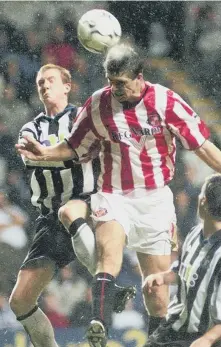  ??  ?? Niall Quinn scores at St James’s Park.