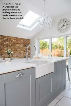  ??  ?? OLD AND NEW
A Quooker tap provides instant boiling water and looks smart above the butler-style sink