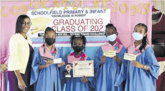  ??  ?? Kerene Nelson (left), Lasco Teacher of the Year in 2016-17, with recipients of the Kerene Nelson Signature of Excellence Fund (from second left) Sabrena Bruce, Gianna Salmon, Deandrea Rowe and Altoria Russell.