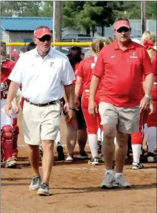  ?? MARK HUMPHREY ENTERPRISE-LEADER ?? Farmington head softball coach Randy Osnes (left) and assistant Steve Morgan walk off the field after the Lady Cardinals secured the school’s first wins in 5A State tournament play this weekend. Farmington got victories over Magnolia (5-4) Thursday,...