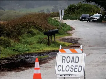  ?? PHOTOS BY TESS KENNY — MONTEREY HERALD ?? While Scenic Road in Carmel is repaired from recent storm damage, the roadway will be closed from Valley View Avenue to Carmelo Road.