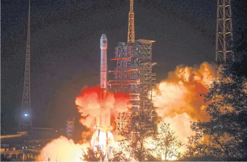  ??  ?? TRIP BEGINS: A Long March 3B rocket lifts off from the Xichang launch centre in Xichang in China’s southweste­rn Sichuan province early yesterday.