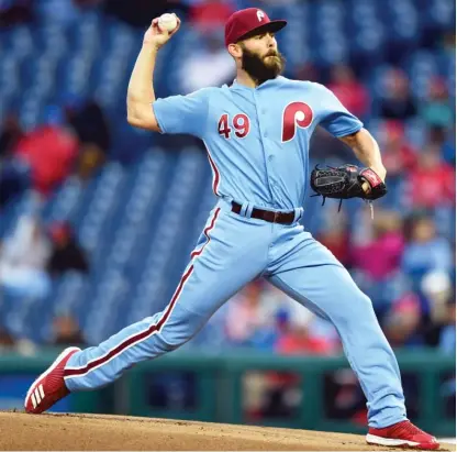  ?? DERIK HAMILTON/ AP ?? Jake Arrieta, who is guaranteed three years and $ 75 million from the Phillies, is 3- 1 with a 3.49 ERA in five starts.