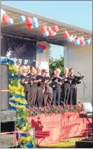  ??  ?? The Mural Town choir on stage.