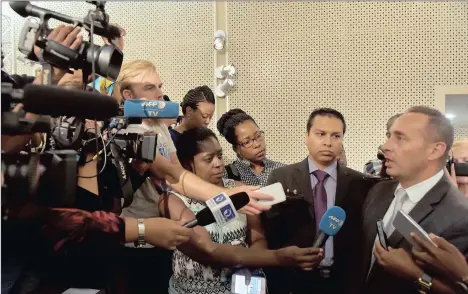  ?? PICTURE: OUPA MOKOENA ?? CLAIMS: Kaveen Jimmy, Reshall’s brother, with his lawyer Rod Montano, addresses the media after the Kuga briefing.