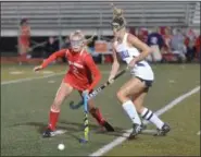  ?? THOMAS NASH — DIGITAL FIRST MEDIA ?? Owen J. Roberts’ Julia Lamb (2) and Phoenixvil­le’s Kyra Trafford (13) chase to a ball in Tuesday’s PAC semifinal.