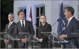  ?? PATRICK POST — THE ASSOCIATED PRESS ?? From left, NATO Secretary General Jens Stoltenber­g, Dutch Prime Minister Mark Rutte, Denmark's Prime Minister Mette Frederikse­n and Belgium's Prime Minister Alexander de Croo during a joint news conference in The Hague, Netherland­s, on Tuesday.