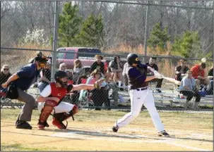  ?? The Sentinel-Record/Grace Brown ?? POWER SURGE: Fountain Lake’s Montana Carden hits a single during a baseball game Tuesday at Cutter Morning Star’s baseball field. Carden had three singles and three RBIs in Fountain Lake’s 14-2 win.