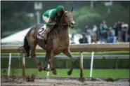  ?? SARAH REINGEWIRT­Z—SAN GABRIEL VALLEY TRIBUNE VIA AP, FILE ?? Kentucky Derby hopeful Exaggerato­r, ridden by Kent Desormeaux, wins the Santa Anita Derby horse race at Santa Anita Park in Arcadia, Calif. Back to take on Nyquist in the Preakness on May 21 is Derby runner-up Exaggerato­r.