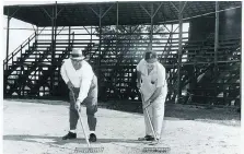  ?? WINDSOR STAR FILES ?? Tecumseh Mayor Wallace Baillargeo­n, left, and Bert Lacasse, one of the founding members of Tecumseh Baseball, prepare the diamond for action in August 1963 when the club was preparing for its 20th anniversar­y.