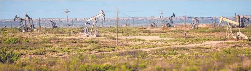  ?? FILE PHOTO ?? Numerous pump jacks operate in December in the oil fields of Loco Hills, between Artesia and Hobbs.