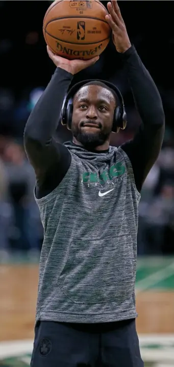  ?? STUART CAHILL / HERALD STAFF ?? ‘LIMITED MINUTES’: Celtics guard Kemba Walker will return to action tonight against the Brooklyn Nets.