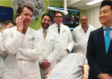  ??  ?? Photo courtesy of Johns Hopkins Medicine shows the medical team (from left) Drs. Richard Redett,Trinity Bivalacqua, Brandacher Gerald, Arthur Bud Burnett and W P Andrew Lee (right), professor and director of plastic and reconstruc­tive surgery at the...