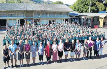  ?? PHOTOS: CRAIG BAXTER ?? Shining examples . . . Staff and pupils at East Taieri School (above) and West Gore School (below).