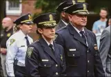  ?? Arnold Gold / Hearst Connecticu­t Media file ?? New Haven Interim Police Chief Renee Dominguez, center, walks alongside Assistant Chief Karl Jacobson, right — the latest nominee for chief — in a funeral procession for New Haven police Officer Joshua Castellano on Sept. 24, 2021, in New Haven.