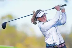  ?? MATT SULLIVAN/GETTY IMAGES ?? Brooke Henderson tees off during the first round at the Diamond Resorts Tournament of Champions in Lake Buena Vista, Fla, Thursday. The Canadian carded a 65 for a share of the lead.