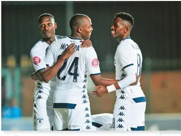  ??  ?? Hotto (l) celebrates a goal with teammates during an Absa Premiershi­p match against Free State Stars.