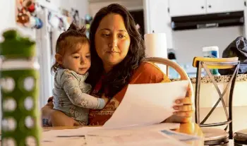  ?? Kevin Painchaud/KFF Health News ?? Sara England got a $97,599 bill after her infant son, Amari Vaca, was carried by air ambulance to UCSF Medical Center during a medical emergency tied to RSV.