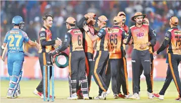  ?? PTI ?? Sunrisers Hyderabad’s players celebrate after defeating Rajasthan Royals’ during IPL T20 cricket match in Jaipur on Sunday