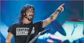  ?? LEO CORREA/AP PHOTO ?? Dave Grohl of the band Foo Fighters performs at the 2019 Rock in Rio music festival in Rio de Janeiro, Brazil.