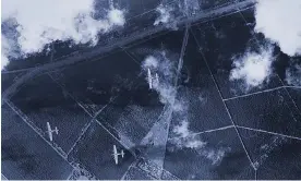  ?? Photograph: Historic England/USAAF/PA Media ?? B-17 bombers of the Eighth Air Force fly over the Brecks in Norfolk during a break in the clouds.