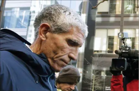  ?? STEVEN SENNE — THE ASSOCIATED PRESS ?? William “Rick” Singer founder of the Edge College &amp; Career Network, departs federal court in Boston on Tuesday after he pleaded guilty to charges in a nationwide college admissions bribery scandal.