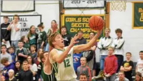  ?? JOHN BREWER - ONEIDA DAILY DISPATCH ?? Hamilton senior Trevor Dow goes in for a layup against Copenhagen in Section III Class D opening round postseason play on Friday, Feb. 16.