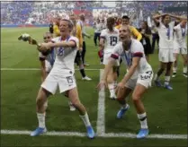  ?? DAVID VINCENT - THE ASSOCIATED PRESS ?? United States’ Megan Rapinoe , left, celebrates with teammates their victory in the Women’s World Cup final soccer match between US and The Netherland­s at the Stade de Lyon in Decines, outside Lyon, France, Sunday, July 7, 2019. US won 2:0.