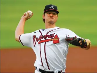  ?? AP FILE PHOTO/JOHN AMIS ?? Mike Soroka, who was injured early last season after starting the opener for the Atlanta Braves, threw Thursday as spring training began for the team’s pitchers and catchers.