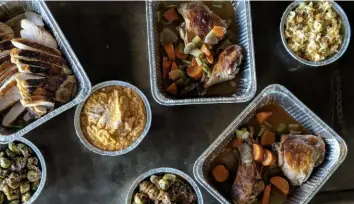  ?? Station ?? Station in Bloomfield is offering a ready-to-heat meal that includes turkey two ways, Brussels sprouts and whipped sweet potatoes.