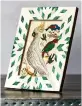  ?? ?? For a small flash of green, try conjuring an exotic scene inside this Aztec inspired frame, such as a parrot postcard or print.
Single sheepskin rug in sage, £80, Baa Stool