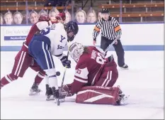  ?? Steve Musco / Yale Athletics ?? Yale’s Rebecca Foggia misses a rebound in front of Colgate goaltender Hannah Murphy in the ECAC championsh­ip game on Saturday.