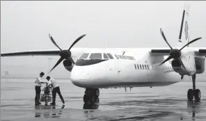  ?? LIN YIZENG / FOR CHINA DAILY ?? A turboprop aircraft is seen at the Yantai Internatio­nal Airport in Yantai, Shandong province.