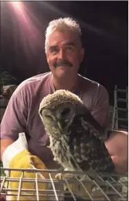  ?? Erin Hedden / Contribute­d photo ?? Brad Hedden with an owl he rescued.