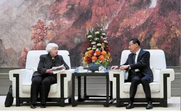  ?? ?? Good intentions: yellen and Guangdong governor Wang Weizhong attending a conference in Baiyun in southern China. yellen was in the country for five days of meetings as the two sides discussed ways to avoid open conflict and enhance trade. — ap
