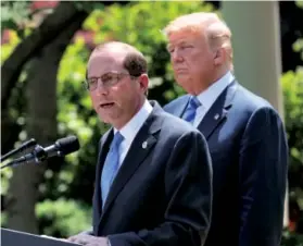  ?? AP PHOTOS ?? ‘JUNK INSURANCE’: President Trump, above, listens as Secretary of Health and Human Services Alex Azar speaks in May. The HealthCare. gov website is shown, top. Now consumers have more plan choices.