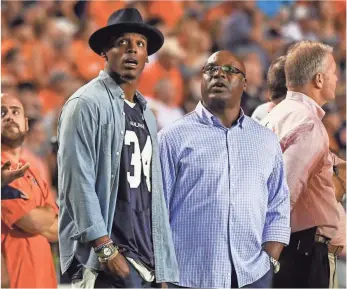  ?? SHANNA LOCKWOOD, USA TODAY SPORTS ?? Bo Jackson, right, says of Cam Newton, a fellow former Auburn star and Heisman Trophy winner: “Every time he takes a hit to his head, that scares me, it scares the hell out of me.”