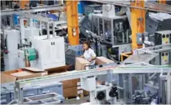  ??  ?? In this May 25, 2017 file photo, an employee works on a factory floor at a Stihl Inc. production plant in Virginia Beach, Va. The Commerce Department reported on US factory orders for July yesterday.—AP